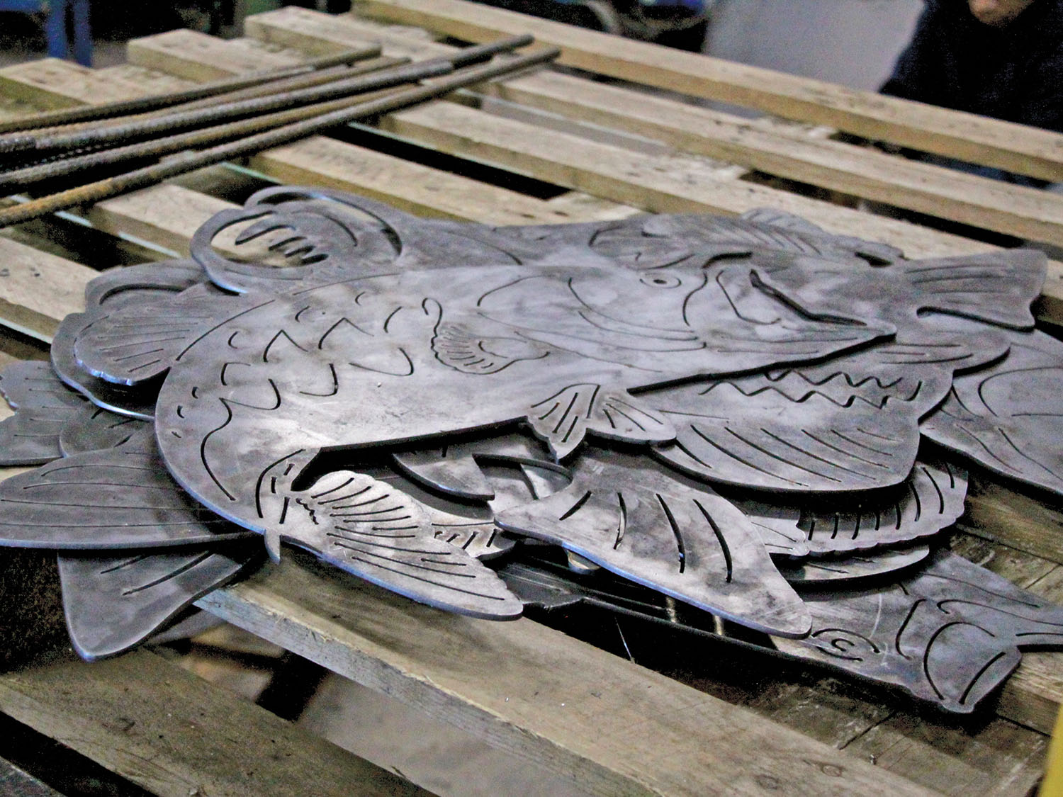 Students create fish art project for Main Street median - The New Era