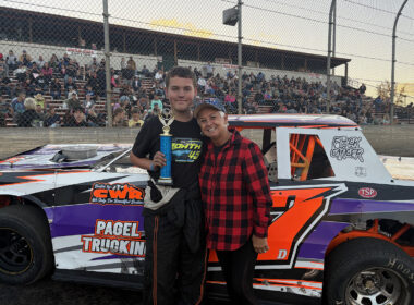 Street Stocks Trophy Dash winner Danner Myers (left) celebrates with honorary trophy girl Denise Estep (right), who returned to present trophies after once serving as a Willamette Speedway trophy girl years ago.